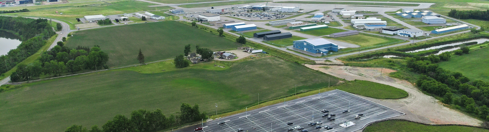 Aerial image of airport 2023 showing parking lot